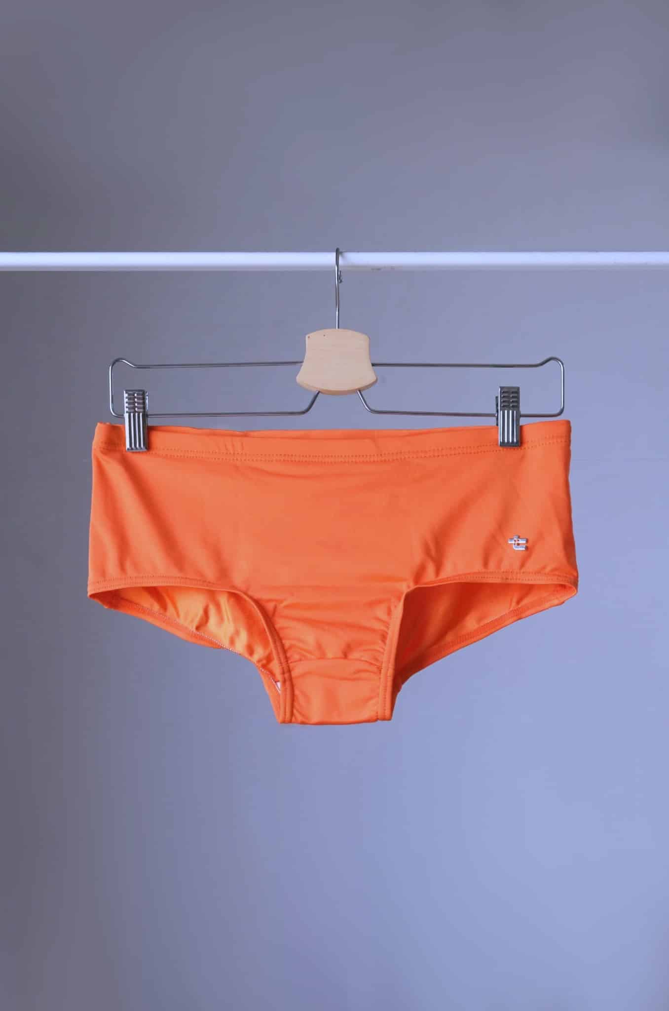 Orange TROPIC Vintage 70's Swim Briefs on hanger