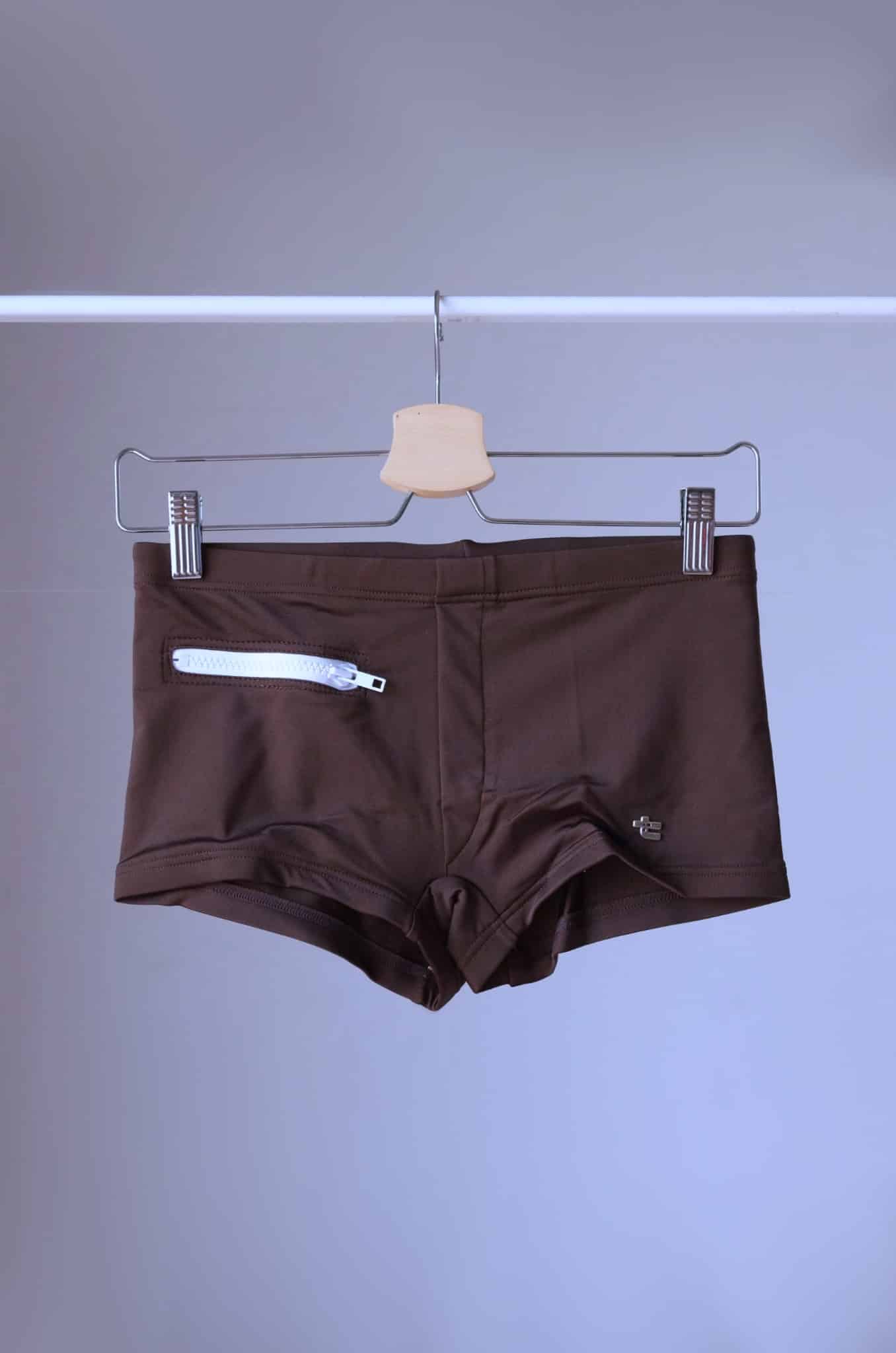 Brown Vintage 70's Swim Briefs with Pocket laid on hanger