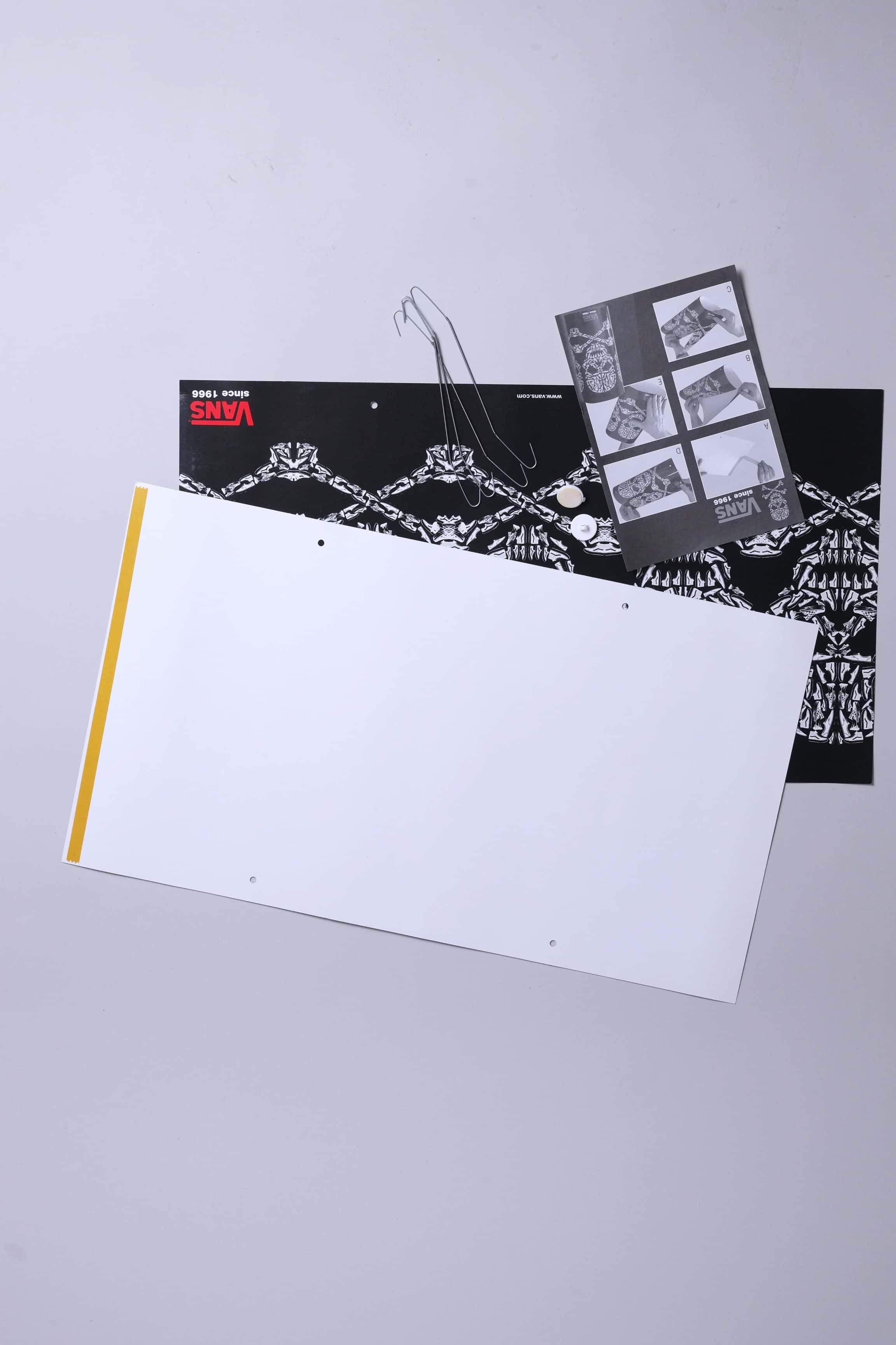 Front and back sheets of VANS 2008 skull mobile display, showing graphics and assembly hardware