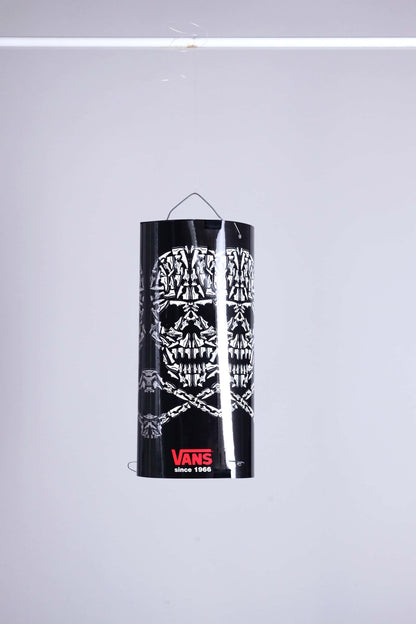 VANS skull mobile display fully assembled and suspended, showcasing skull pattern made of sneakers.