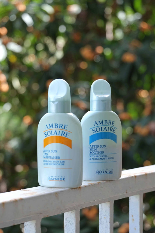 AMBRE SOLAIRE Vintage Sun Tan bottles with nature background