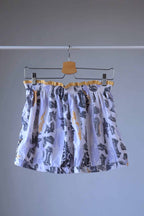vintage printed volkl tennis shorts on hanger from the back