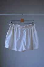 VÖLKL Vintage Women's Tennis Shorts in solid white from the back