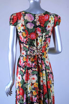 Close-up of corset-style lace-up waist tie on vintage 90s floral maxi dress