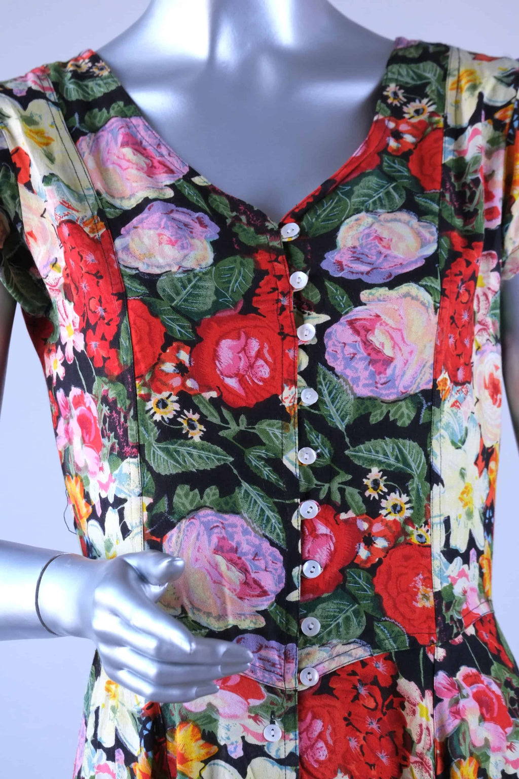 Front bodice of vintage 90s floral maxi dress with mother-of-pearl button closure and V-neckline
