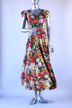 Front view of vintage 90s floral maxi dress on mannequin showing cap sleeves and flowing skirt