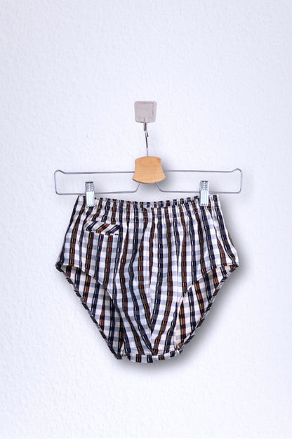 Front view of a vintage late 1950s to early 1960s men's swim brief on a hanger. The brief features a plaid pattern in white, blue, and red, with a small front flap pocket.