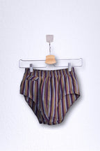 Front view of a vintage late 1950s to early 1960s men's swim brief on a hanger. The brief features vertical stripes in muted brown, grey, and maroon tones, with a small front flap pocket.