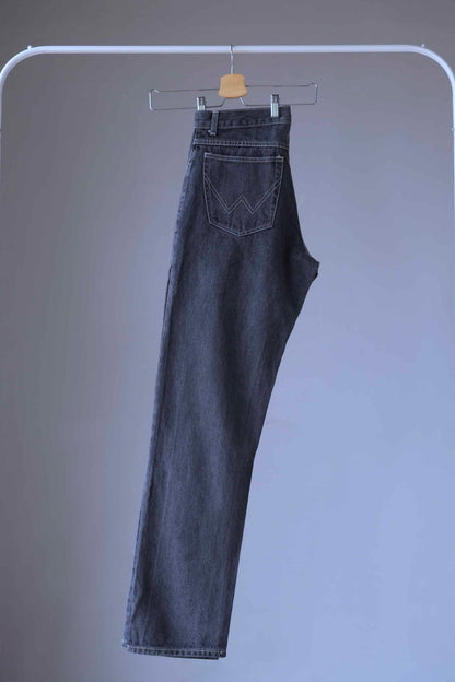 WRANGLER Vintage 90's Black Wash Jeans on hanger and shot from the side