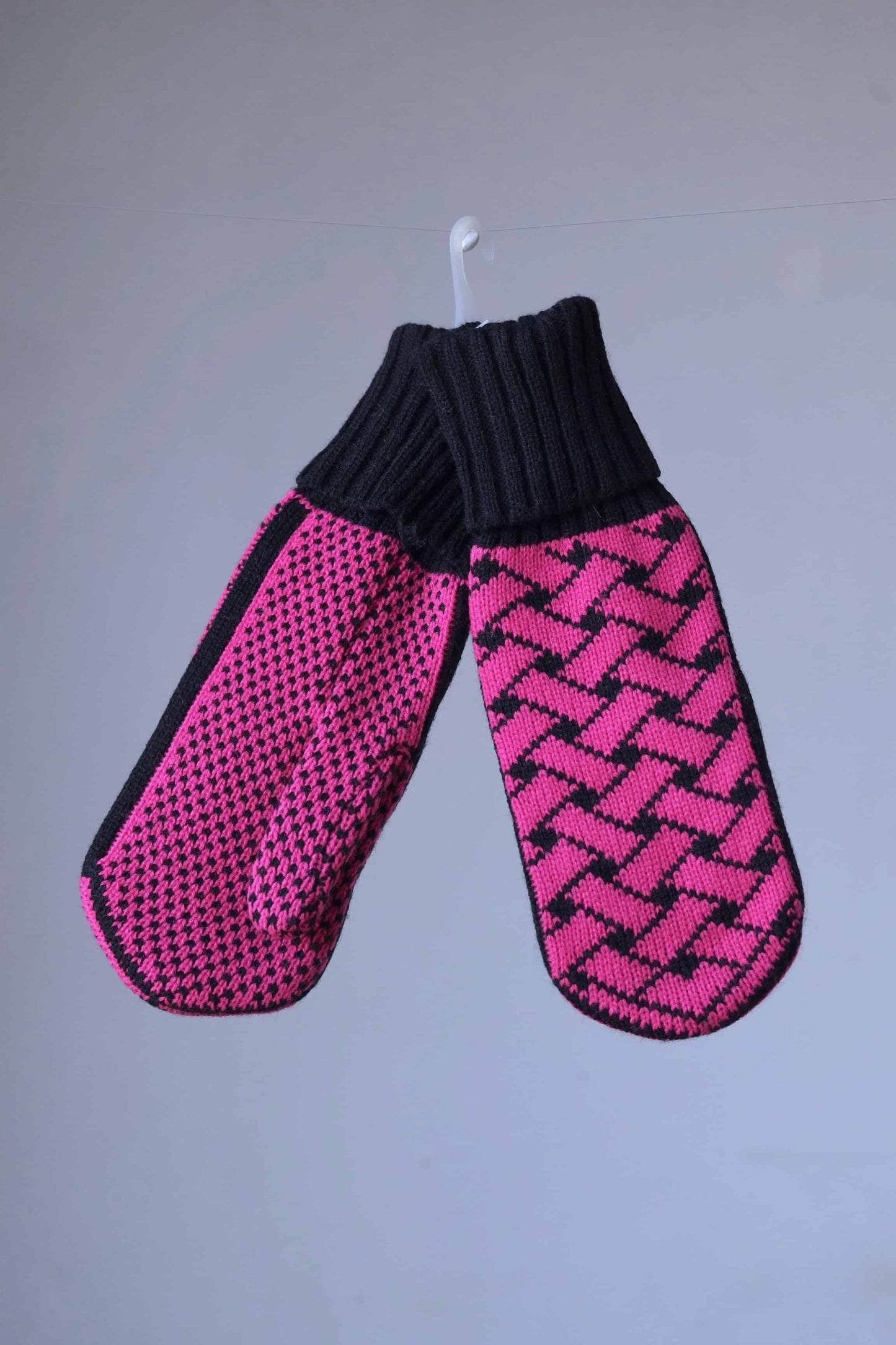 Pink and black wool mittens