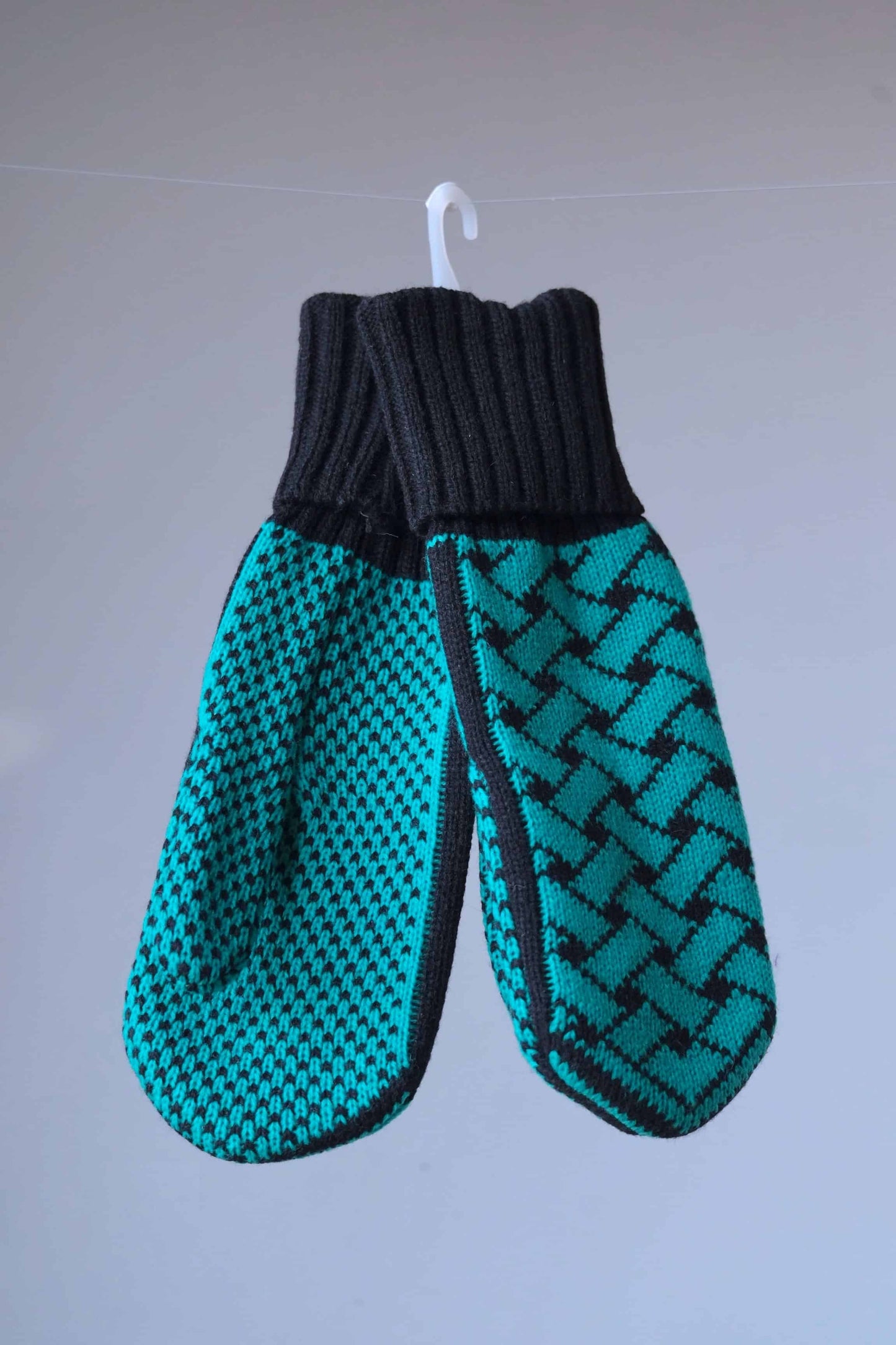 Green and black wool mittens
