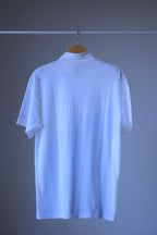 Löffler 90s men’s tennis polo in white, back view