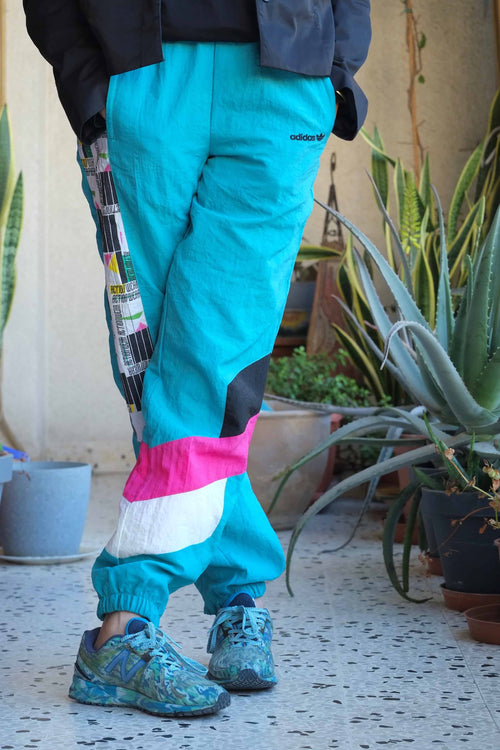 Vintage Adidas 90's Track Pants jade and multi colored on model