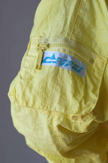 Detail of a zipper pocket of the CAMPRI Vintage 90's Ski Suit in yellow