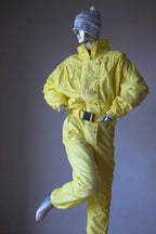 CAMPRI Vintage 90's Ski Suit in yellow displayed on mannequin