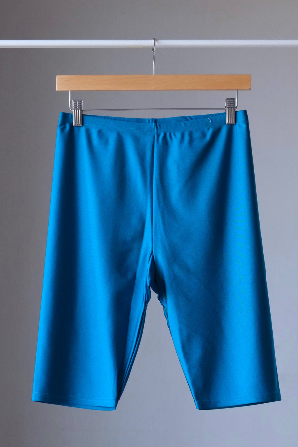 SOLAR Lycra Biker Shorts teal on hanger
