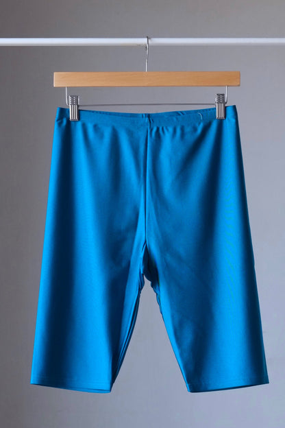 SOLAR Lycra Biker Shorts teal on hanger