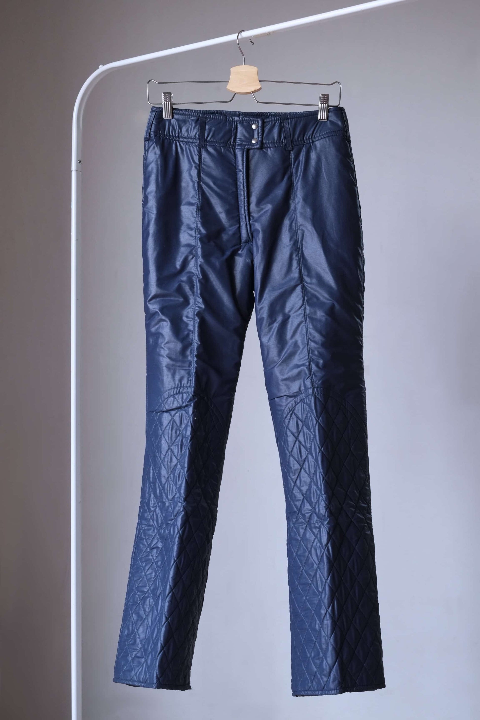 Vintage navy ski pants of 2-peice ski suit on hanger