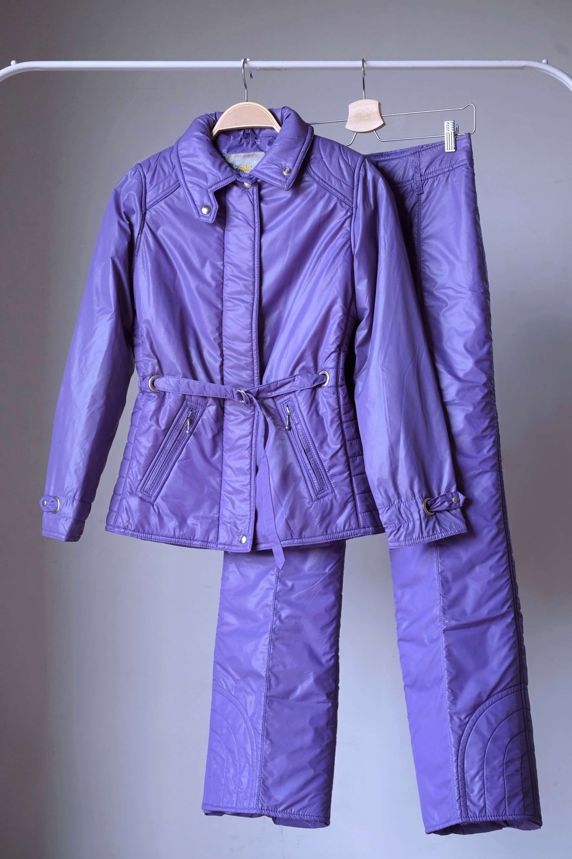 Purple Mossant Vintage 70s women's 2-piece ski suit on hanger