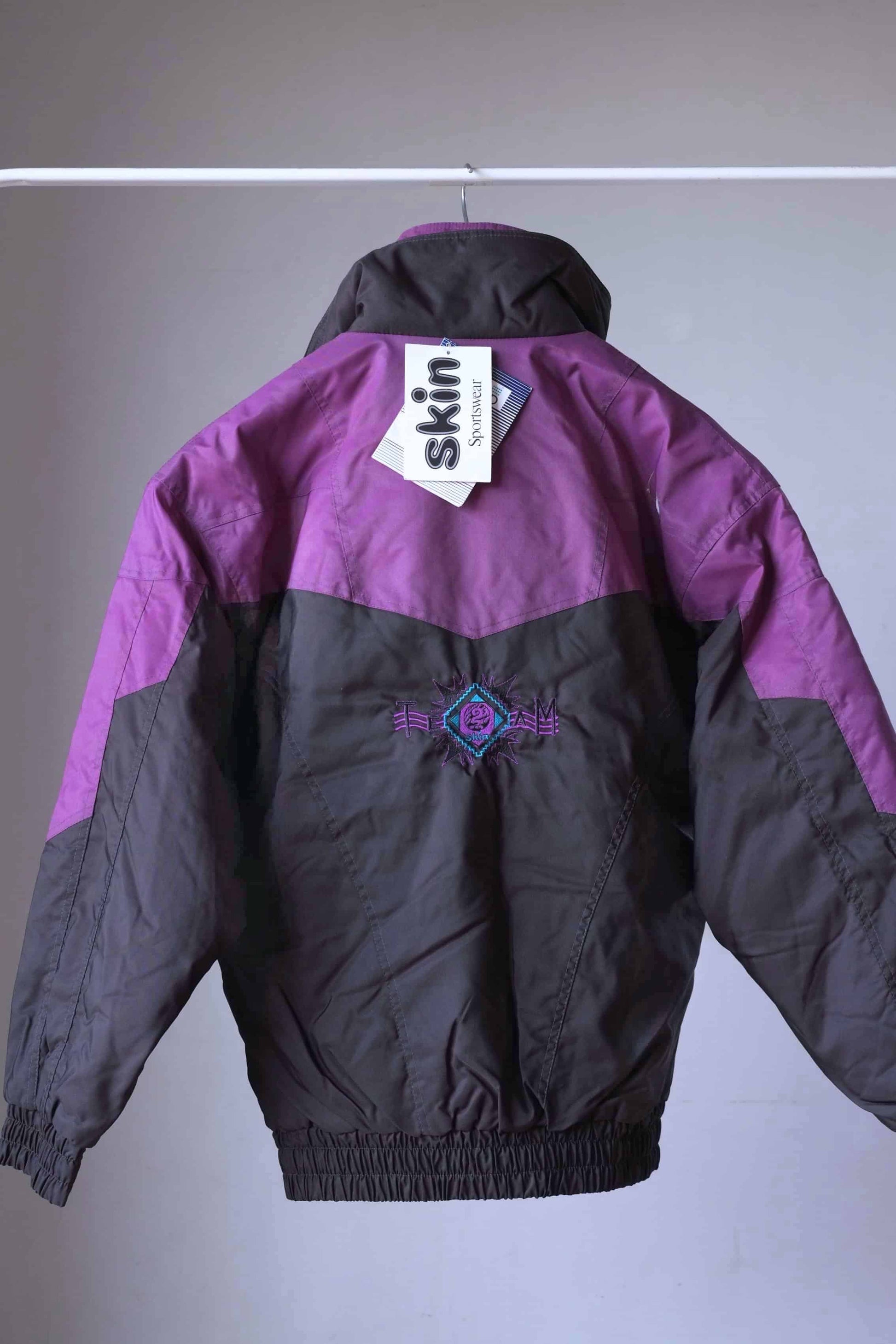 Back view of Vintage Men's 90's Ski Jacket black purple