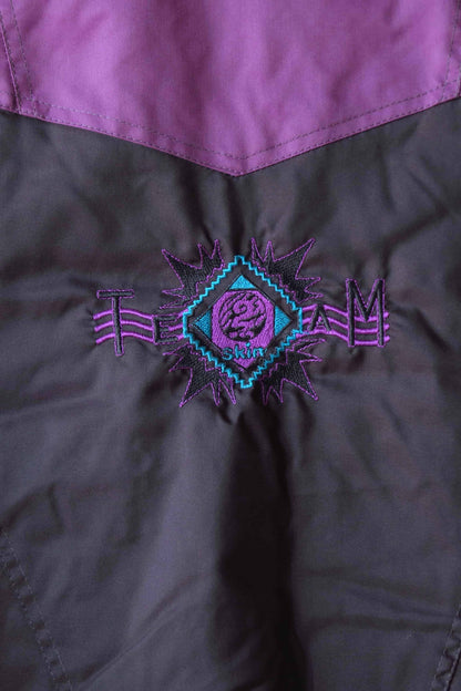 Close view of the embroidered emblem on the back of Vintage Men's 90's Ski Jacket