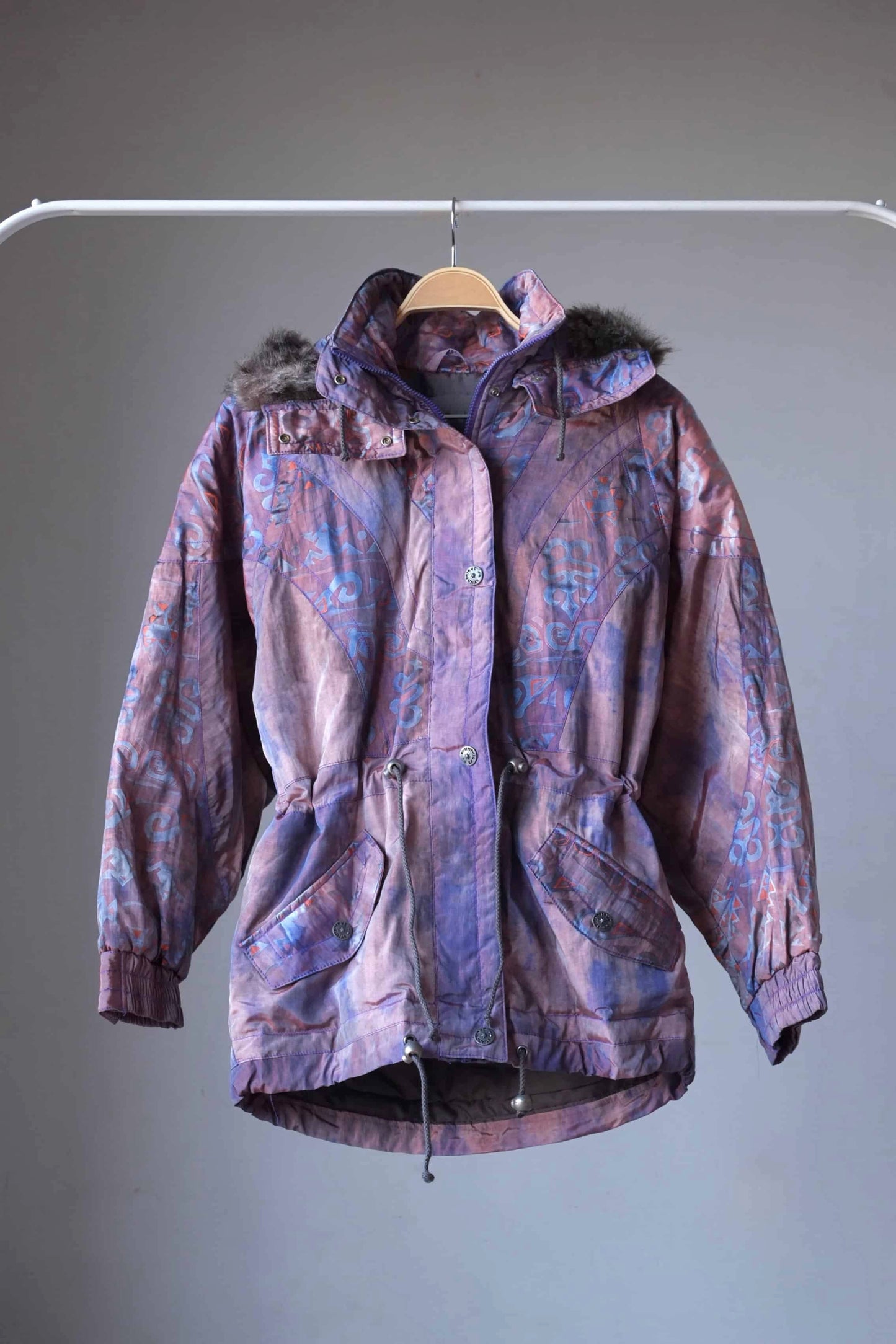 Vintage 90's Women's Ski Jacket in tie dye with fur lined hoodie on hanger