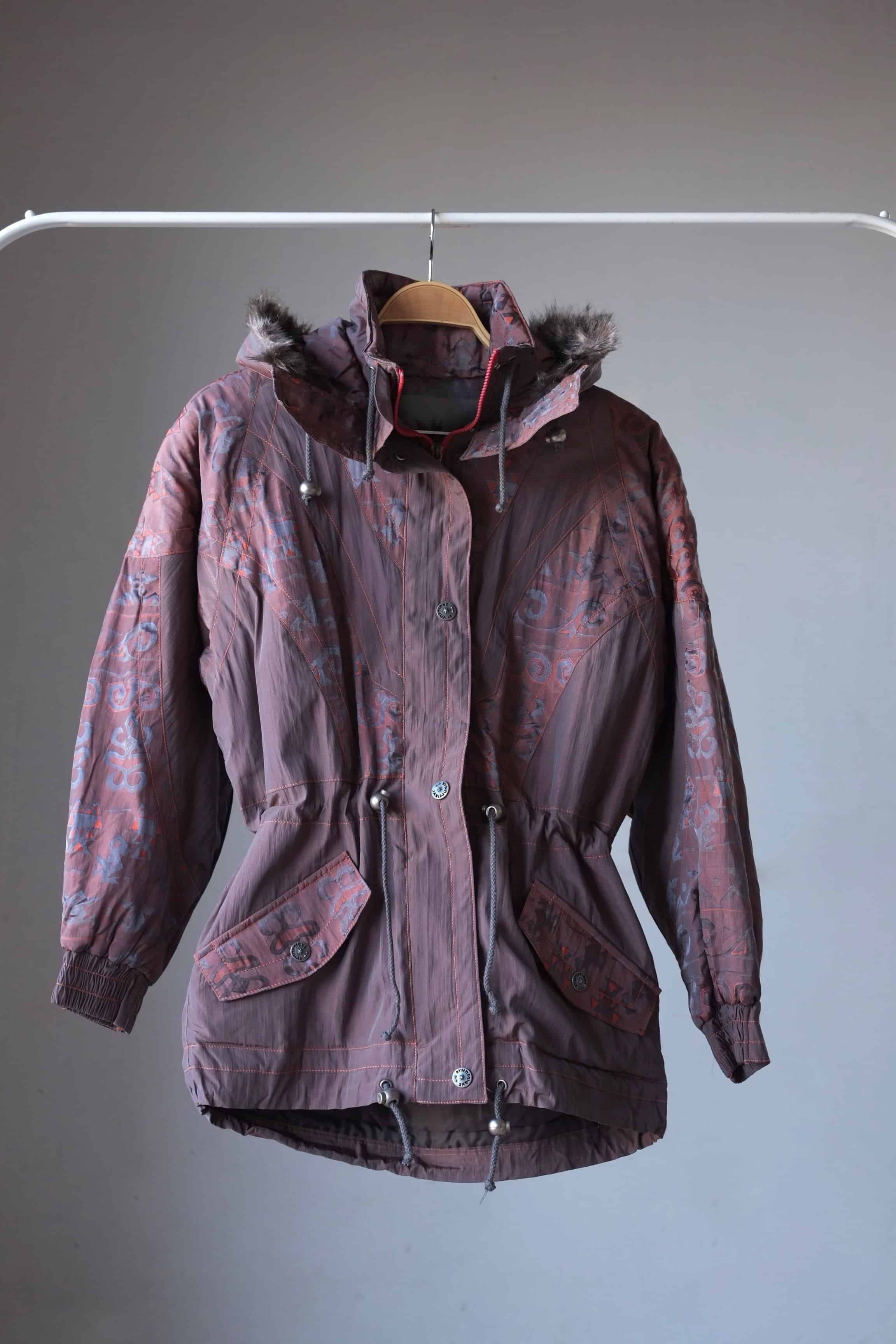 Vintage 90's Women's Ski Jacket in maroon with fur lined hoodie on hanger