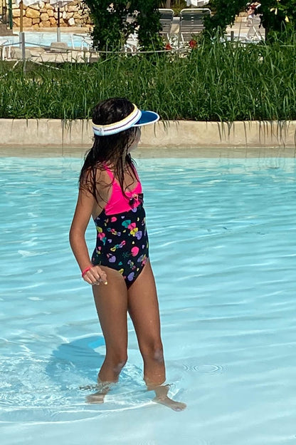 girl in pool wearing 80's Girls Heart Print One-piece 