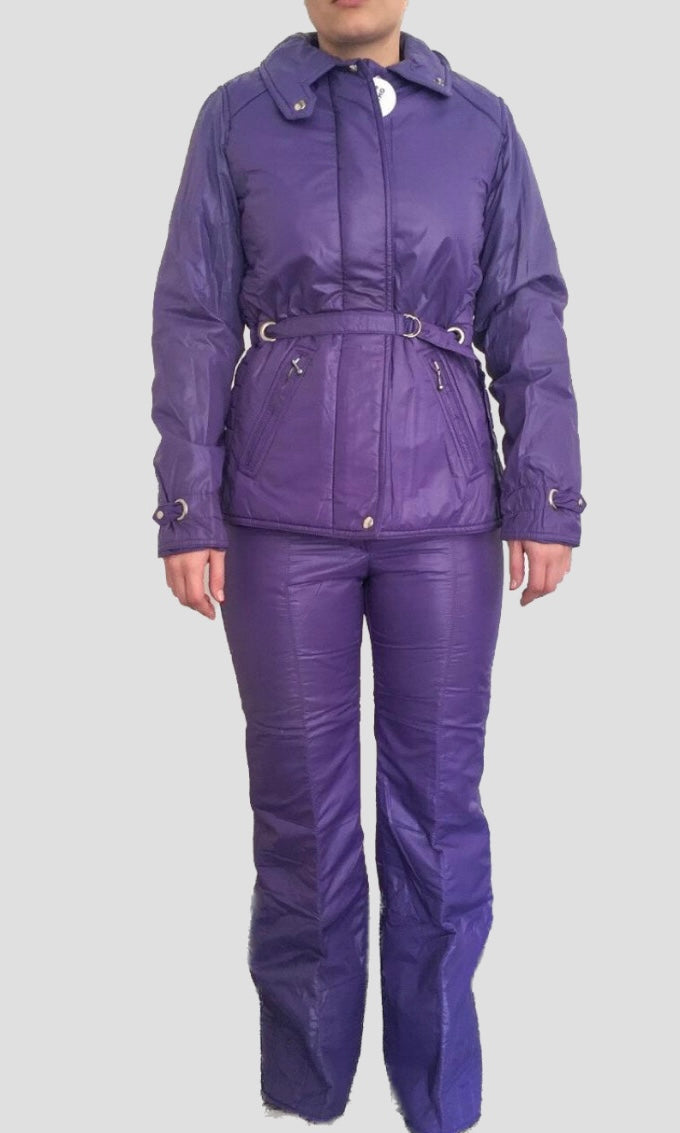 Model on white background wearing a mossant 70s vintage purple 2-piece ski suit
